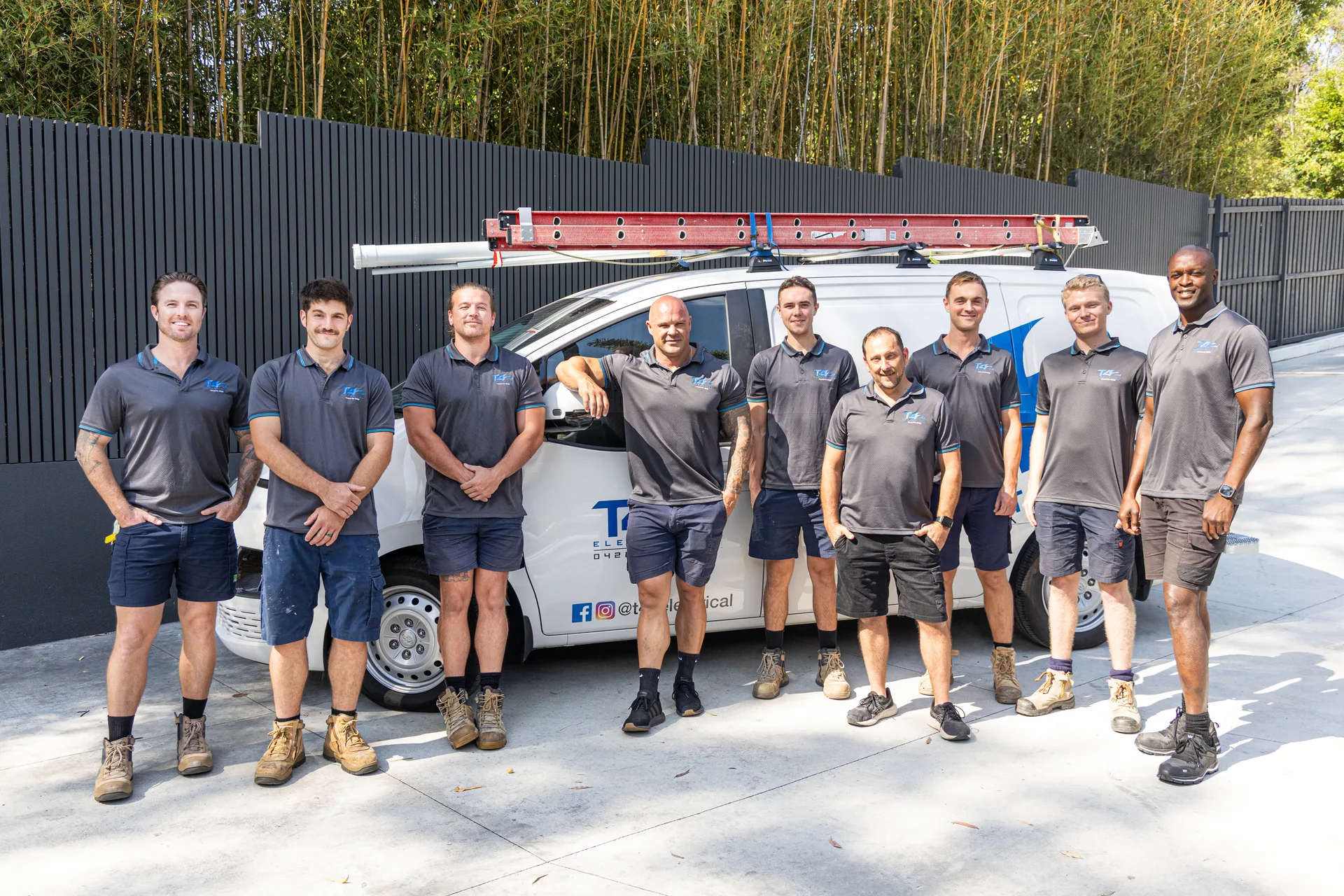 The Family Electrician Palm Beach team with a service van